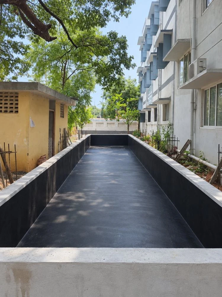 Lined wetland basin during construction at the Ambattur school